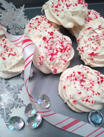 Vanilla Meringue Cookies Drizzled in White Chocolate and Crushed Candy Cane Sprinkles