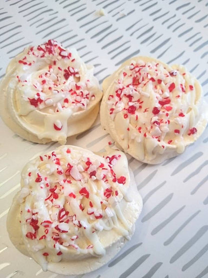 Vanilla Meringue Cookies Drizzled in White Chocolate and Crushed Candy Cane Sprinkles