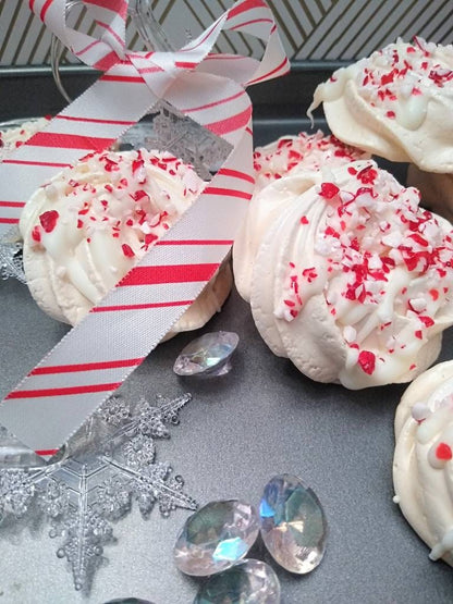 Vanilla Meringue Cookies Drizzled in White Chocolate and Crushed Candy Cane Sprinkles