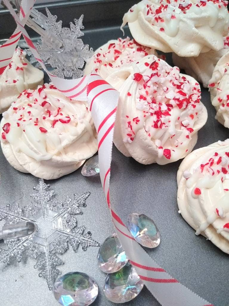 Vanilla Meringue Cookies Drizzled in White Chocolate and Crushed Candy Cane Sprinkles